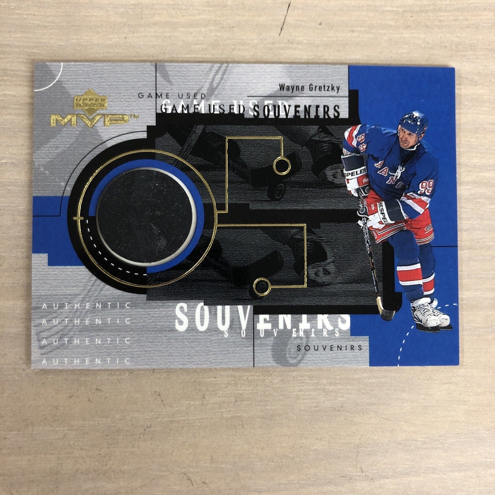 1999 Upset Deck Wayne Gretzky Game Used Souvenirs Game Used Hockey Puck GU6