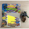 1991 TMNT Wacky Action Machine Gunnin’ Rocksteady Figure + Cardback