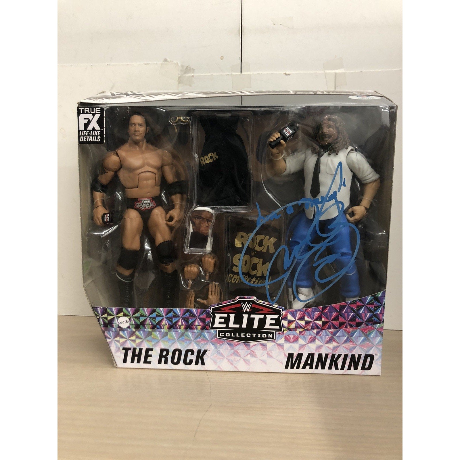 WWE Elite 2-Pack Rock & Mankind Rock & Sock Connection Signed By Mick Foley PSA